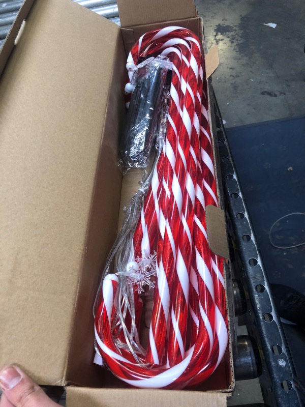 Photo 3 of 28” Candy Cane Lights Outdoor Pathway, 42 Feet in Total Length with 12 Pack Candy Cane Pathway Lights with Shiny Star for Outside Christmas Decorations, 10 LED Lights in Each Light Up Candy Canes 12 Pcs Star