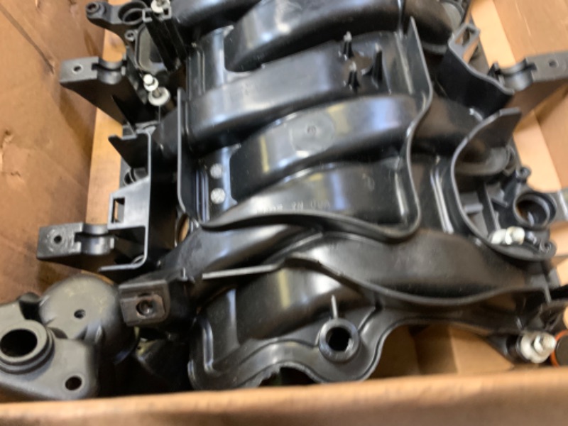 Photo 7 of Dorman 615-523 Engine Intake Manifold for Select Chrysler/Dodge Models --- Box Packaging Damaged, Moderate Use, Scratches and Scuffs on Item as Shown in Pictures, Hardware Loose in Box, Missing Some Hardware
