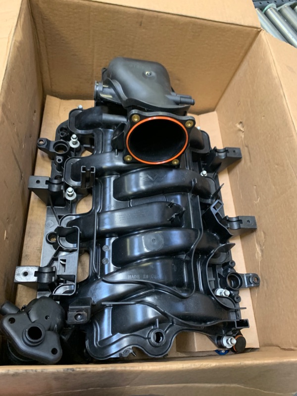 Photo 3 of Dorman 615-523 Engine Intake Manifold for Select Chrysler/Dodge Models --- Box Packaging Damaged, Moderate Use, Scratches and Scuffs on Item as Shown in Pictures, Hardware Loose in Box, Missing Some Hardware
