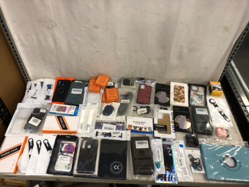 Photo 1 of BAG LOT -- LOTS OF PHONE CASES , WATCH BANDS AND MORE --