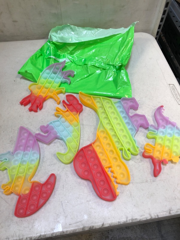 Photo 2 of Dinosaur Toys Party Favors for Kids, Fidget Toy Pop Its Bulk Pack, Stocking Stuffers Sensory Toys Autistic Children Autism ADHD Boys Girls, Treasure Prize Box Fidgets Popit Classroom Small Stress Gift