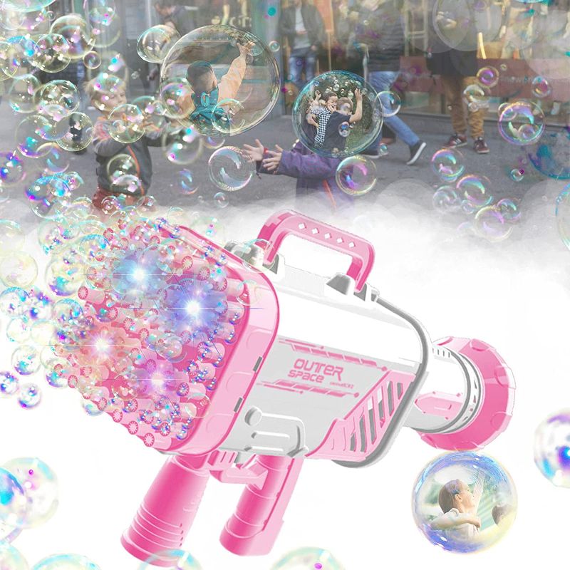 Photo 1 of Bubble Machine Gun, 64 Holes Bazooka Bubble Gun with 30 Pcs Bubble Concentrate Pouch, 2 Bubble Solution, Bubble Rocket Boom Maker for Wedding Summer Party Outdoor Toy, Gift for Adults Boys Girls PINK 