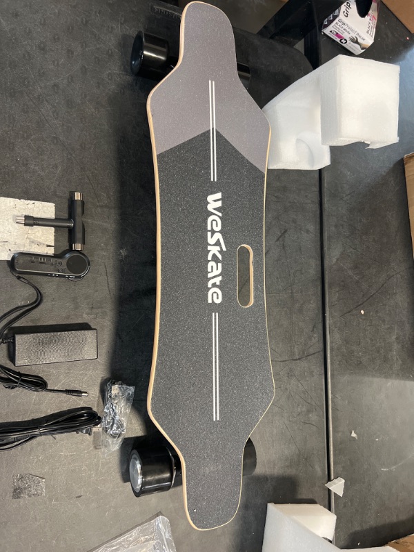 Photo 3 of Electric Skateboard with Remote, 350W Brushless Motor, 12.4 MPH Max Speed, 8 Miles Max Range, Electric Longboard 