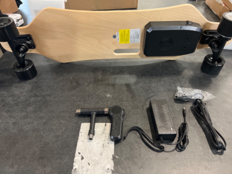 Photo 2 of Electric Skateboard with Remote, 350W Brushless Motor, 12.4 MPH Max Speed, 8 Miles Max Range, Electric Longboard 