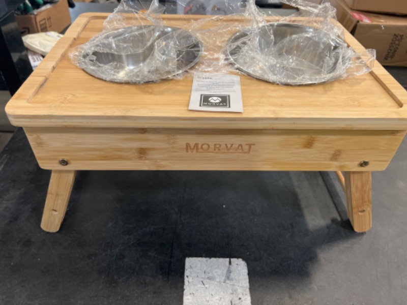 Photo 1 of Morvat Raised Bamboo Wood Double Pet Feeder, Adjustable to 3 Heights, Elevated Feeding Station Stand for Small Medium & Large Dogs Puppies & Cats, Includes 4 Stainless Steel Food & Water Dish Bowls
