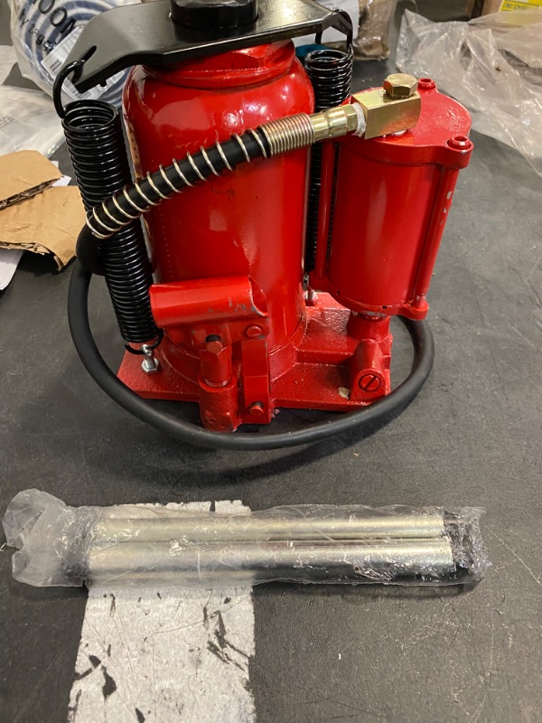 Photo 2 of Powerbuilt 20 Ton Bottle Jack with 9-11/16 inch to 17-5/8 inch lifting range, portable hydraulic car jack with carrying case- Red 647503