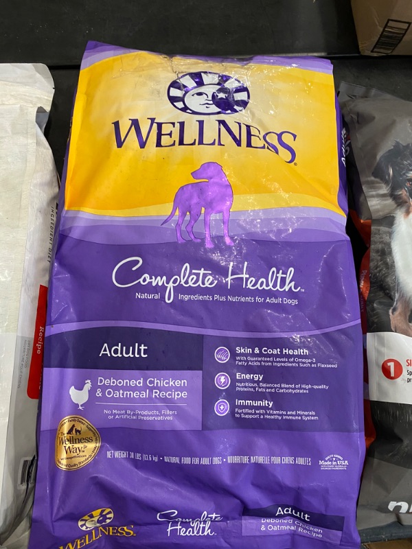Photo 2 of Wellness Complete Health Dry Dog Food with Grains, Made in USA with Real Meat & Natural Ingredients, All Breeds, Adult Dogs (Chicken & Oatmeal, 30-lb) – With Nutrients for Immune, Skin, & Coat Support