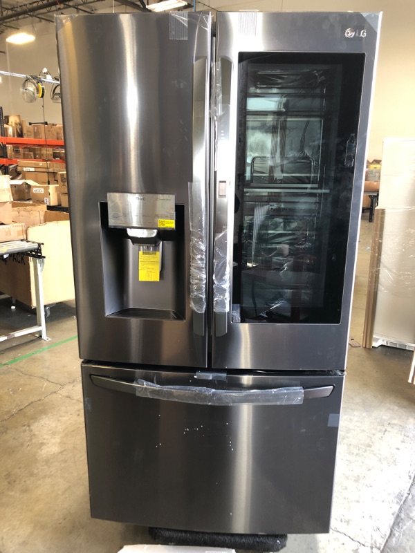 Photo 1 of LG---36 Inch, 30 Cu. Ft. Door-In-Door Refrigerator with Craft Ice Maker
