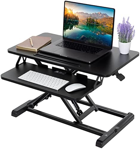 Photo 1 of DAMAGED CORNER***TechOrbits Standing Desk Converter - Particle Board, Adjustable Height Sit to Stand Up Desk Riser for Home Office - Computer, Laptop & Dual Monitor Workstation & Machine Stand - 36 Inch, Black
