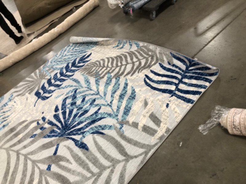 Photo 1 of **USED, NEEDS CLEANING**
7.8  X 10 BLUE,GREY,SILVER RUG