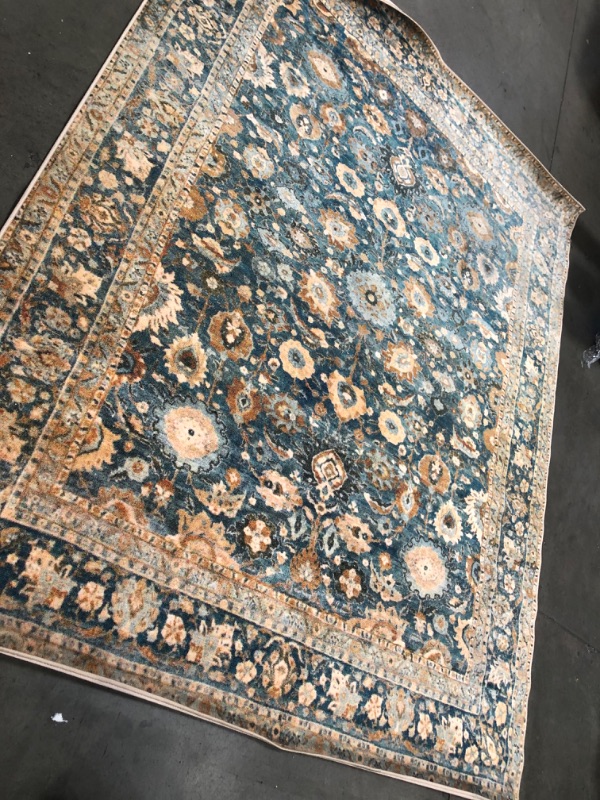 Photo 4 of **USED, NEEDS CLEANING**
7.9 X 9.10 TEAL,ORANGE DESIGN RUG