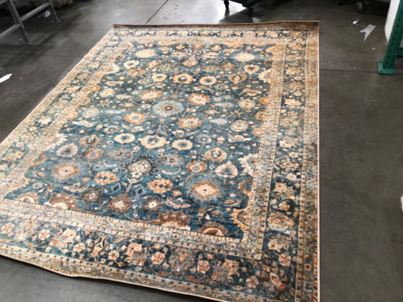 Photo 3 of **USED, NEEDS CLEANING**
7.9 X 9.10 TEAL,ORANGE DESIGN RUG