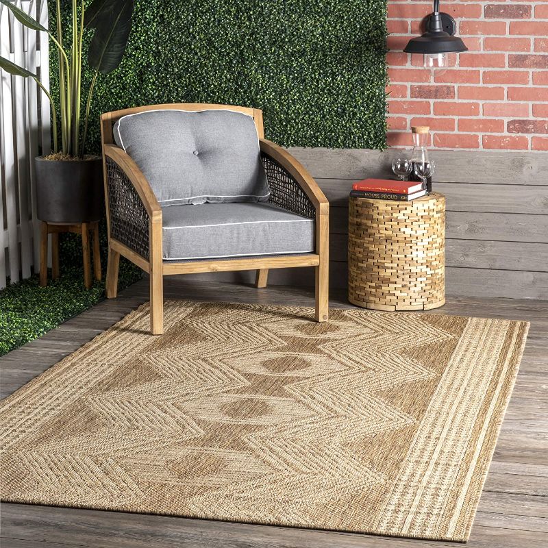 Photo 1 of **USED, NEEDS CLEANING**
 Ranya Tribal Indoor/Outdoor Area Rug, 6' 7" x 9', Light Brown

