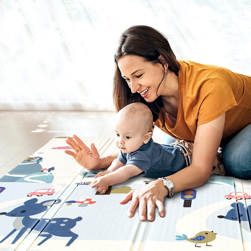 Photo 1 of Gentle Monster XL 0.6 inch Thicker Foldable Foam Baby Play Mat, 77" x 70"x 0.6", Extra Large Waterproof Portable Playmat for Toddlers on Floor (Deer & Rocket Print)
