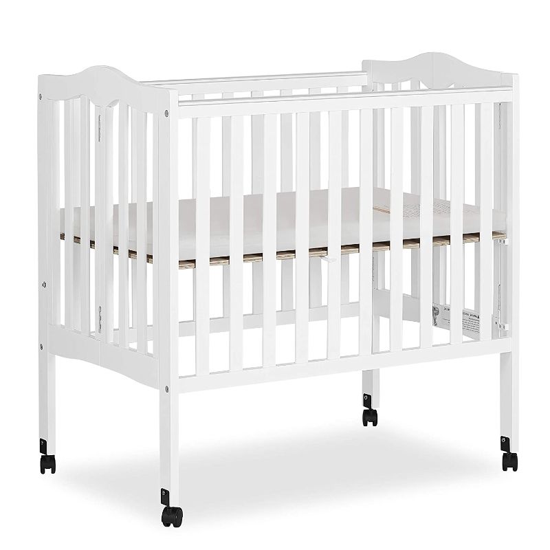 Photo 1 of Dream On Me 2-in-1 Lightweight Folding Portable Stationary Side Crib in Pebble Grey, Greenguard Gold Certified, Baby Crib to Playpen, Folds Flat for Storage, Locking Wheels
