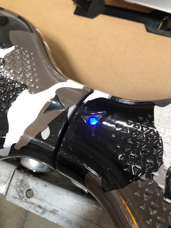 Photo 2 of Hover-1 Helix Electric Hoverboard | 7MPH Top Speed, 4 Mile Range, 6HR Full-Charge, Built-in Bluetooth Speaker, Rider Modes: Beginner to Expert

