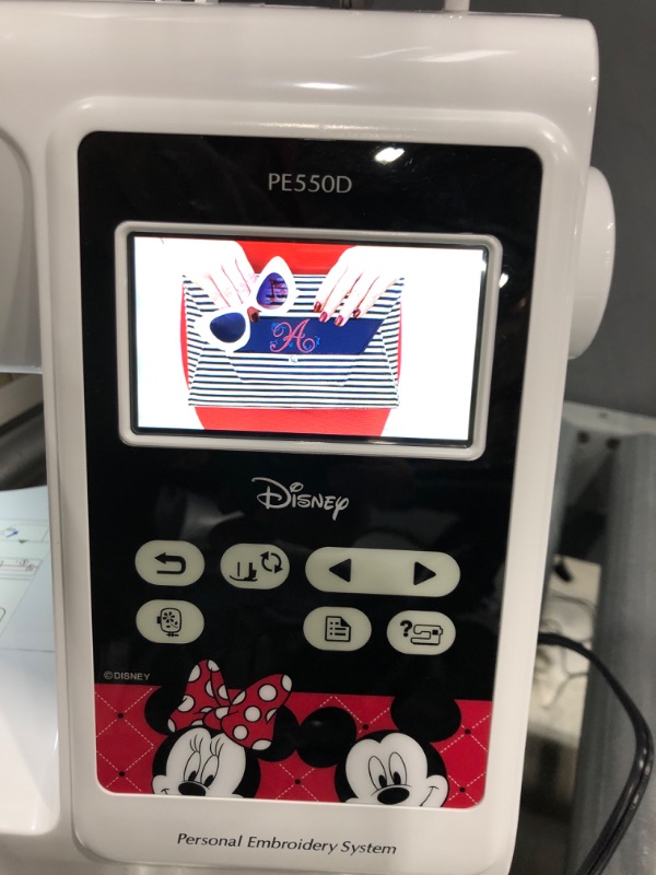 Photo 3 of *STUCK IN ANOTHER LANGUAGE* Brother PE550D Embroidery Machine, 125 Built-in Designs Including 45 Disney Designs, 4" x 4" Hoop Area, Large 3.2" LCD Touchscreen, USB Port, 9 Font Styles
