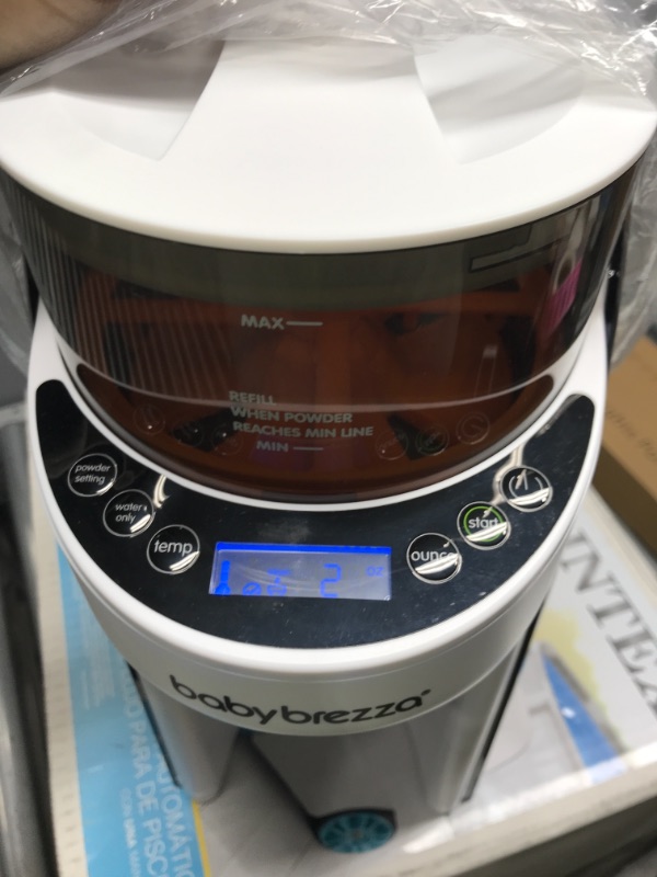 Photo 3 of Baby Brezza Formula Pro Mini Baby Formula Maker – Small Baby Formula Mixer Machine Fits Small Spaces and is Portable for Travel– Bottle Makers Makes The Perfect Bottle for Your Infant On The Go
