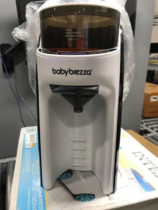 Photo 2 of Baby Brezza Formula Pro Mini Baby Formula Maker – Small Baby Formula Mixer Machine Fits Small Spaces and is Portable for Travel– Bottle Makers Makes The Perfect Bottle for Your Infant On The Go
