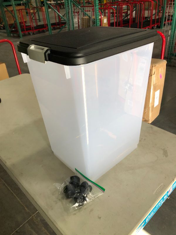 Photo 1 of 69QT plastic tote with wheels