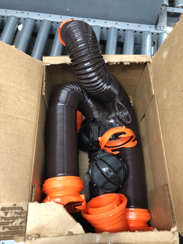 Photo 2 of Camco 20' (39742) RhinoFLEX 20-Foot RV Sewer Hose Kit, Swivel Transparent Elbow with 4-in-1 Dump Station Fitting-Storage Caps Included , Black , Brown 20ft Sewer Hose Kit Frustration-Free Packaging