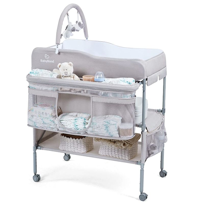 Photo 1 of BabyBond Portable Baby Changing Table, Foldable Changing Table Dresser Changing Station for Infant, Waterproof Diaper Changing Table Pad Topper, Mobile Nursery Organizer for Newborn Essentials (beige)
