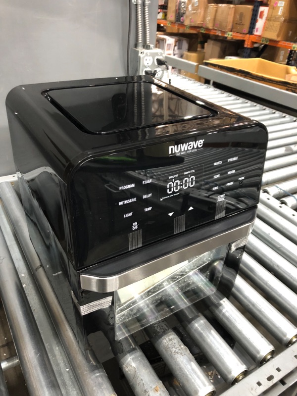 Photo 2 of NUWAVE Brio Air Fryer Smart Oven, 15.5-Qt X-Large Family Size, Countertop Convection Rotisserie Grill Combo, Non-Stick Drip Tray, Stainless Steel Rotisserie Basket.
