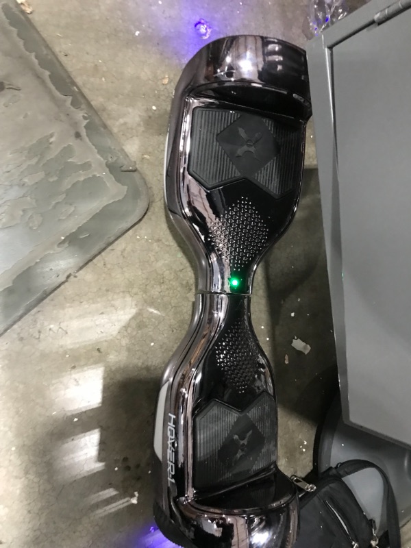 Photo 1 of TURNS ON BUT NOT FUNCTIONAL**Hover-1 Helix Electric Hoverboard | 7MPH Top Speed, 4 Mile Range, 6HR Full-Charge, Built-in Bluetooth Speaker, Rider Modes: Beginner to Expert
