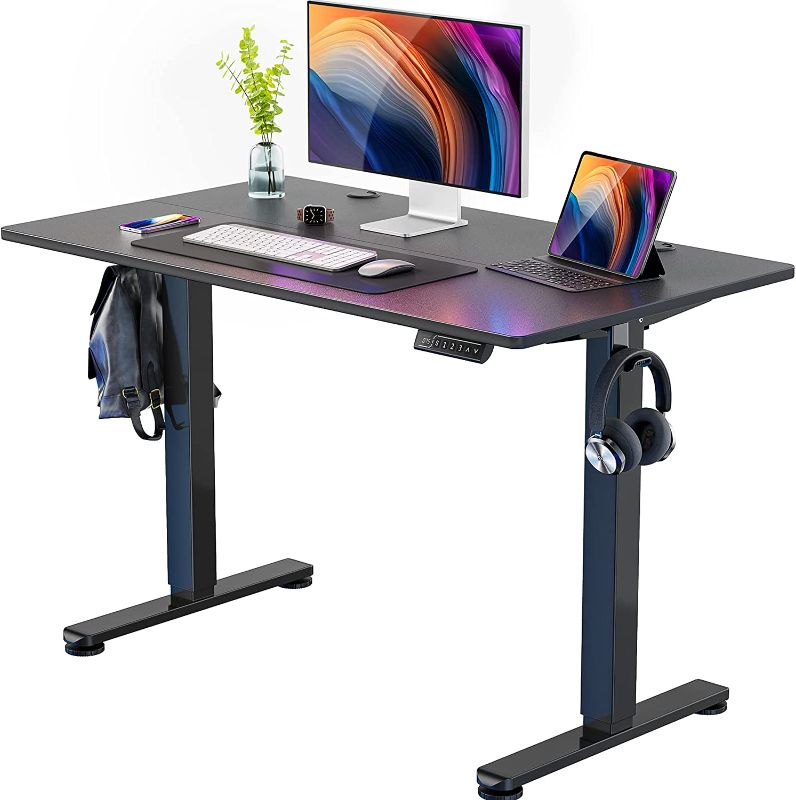 Photo 1 of ErGear Height Adjustable Electric Standing Desk, 48 x 24 Inches Sit Stand up Desk, Memory Computer Home Office Desk (Black)
