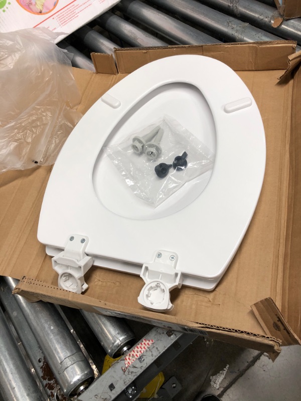 Photo 2 of Bemis 1500EC 390 Toilet Seat with Easy Clean & Change Hinges, Elongated, Durable Enameled Wood, Cotton White Cotton White 1 Pack Elongated Toilet Seat