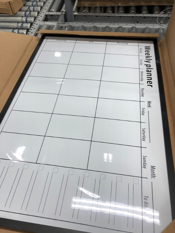 Photo 3 of Amazon Basics Magnetic Dry Erase White Board, 35 x 23-Inch Whiteboard - Black Wooden Frame 23"x35" Magnetic, Wood Frame