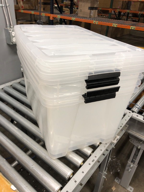 Photo 2 of IRIS USA 72 Qt. Plastic Storage Bin Tote Organizing Container with Durable Lid and Secure Latching Buckles, Stackable and Nestable, 4 Pack, clear with Black Buckle g) 72 Qt. - 4 Pack