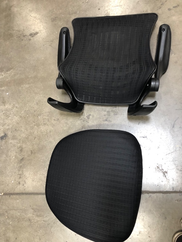 Photo 2 of Flash Furniture Kelista High-Back Black Mesh Swivel Ergonomic Executive Office Chair with Flip-Up Arms and Adjustable Headrest
