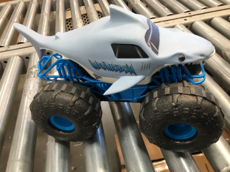 Photo 4 of (DAMAGED)Monster Jam Official Megalodon Storm All-Terrain Remote Control Monster Truck - 1:15 Scale
**REMOTE CONTROLLER STALLS/LAGS ON CAR**
