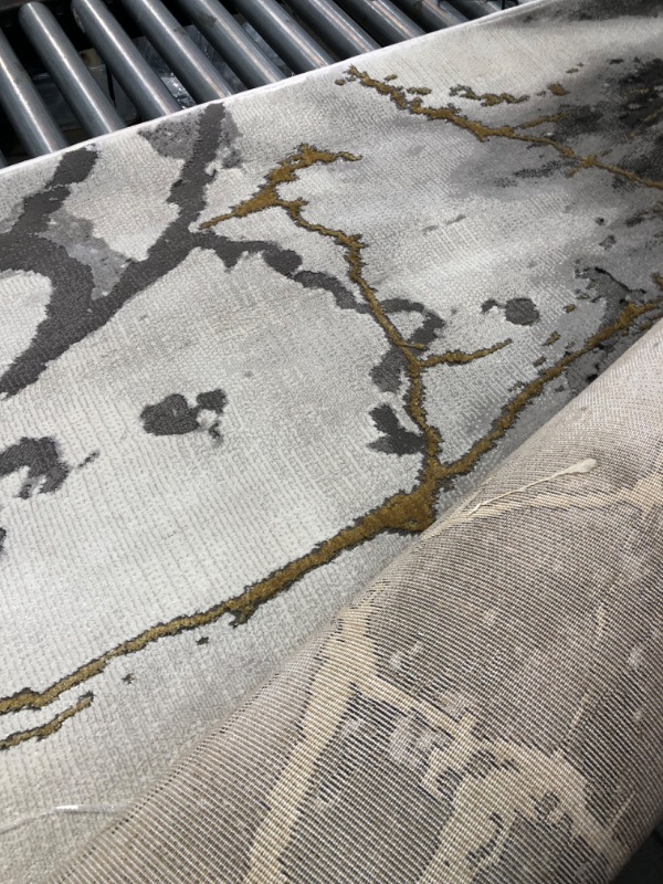 Photo 2 of **used, needs cleaning**
SAFAVIEH Craft Collection 8' x 10' Grey / Gold CFT877F Modern Abstract Non-Shedding Living Room Bedroom Dining Home Office Area Rug 8' x 10' Grey/Gold