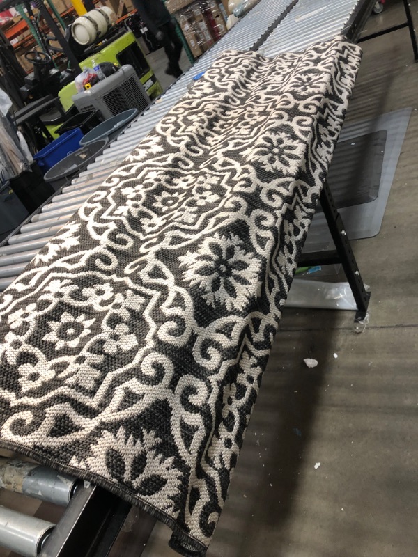 Photo 5 of **used**
Nicole Miller New York Patio Country Danica Transitional Geometric Indoor/Outdoor Area Rug, Black/Grey, 6'6"x9'2" 6'6"x9'2" Rectangle Black/Grey