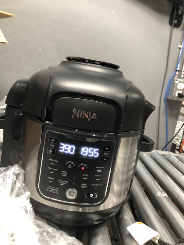 Photo 2 of **broken**
Ninja FD401 Foodi 12-in-1 Deluxe XL 8 qt. Pressure Cooker & Air Fryer that Steams, Slow Cooks, Sears, Sautés, Dehydrates & More, with 5 qt. Crisper Basket, Deluxe Reversible Rack & Recipe Book, Silver
