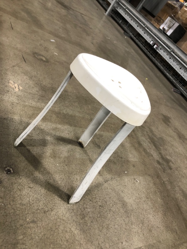 Photo 2 of **HEAVY USE*
TRIANGULAR 3 LEG WHITE STOOL