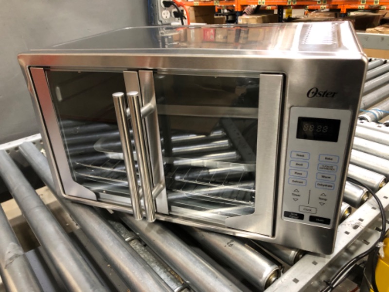 Photo 1 of Oster Convection Oven, 8-in-1 Countertop Toaster Oven, XL Fits 2 16" Pizzas, Stainless Steel French Door
