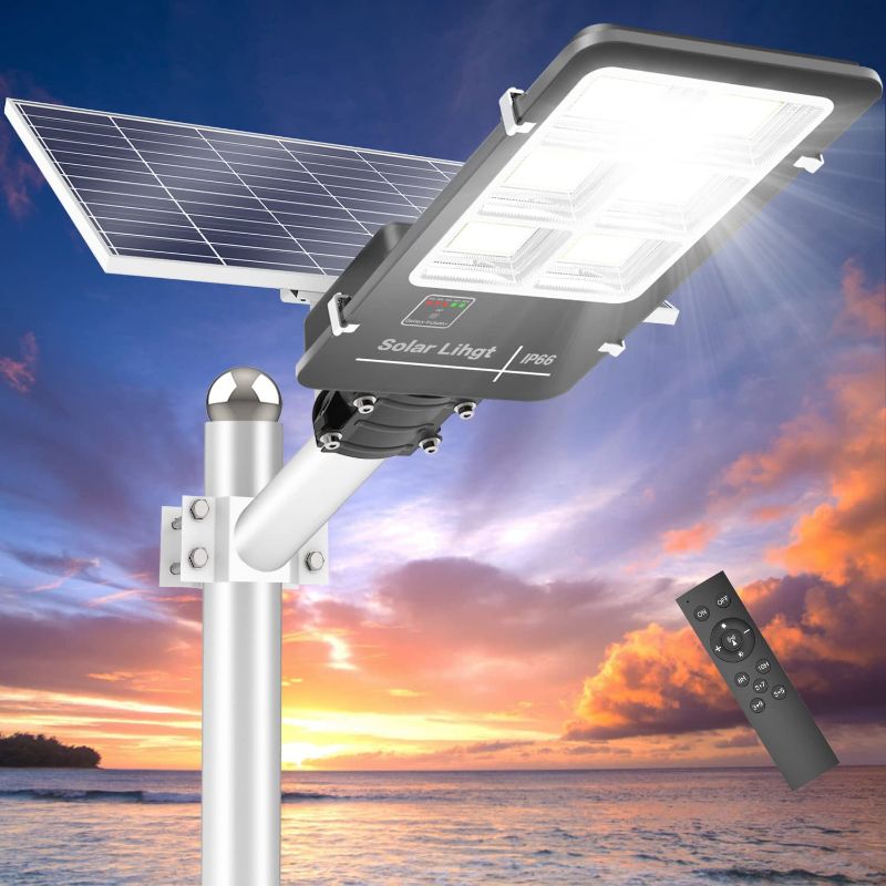 Photo 1 of 1200W Solar Street Light Dusk to Dawn Solar Flood Lights Outdoor with Remote Control, 6500K Daylight White IP66 Waterproof Solar Powered Street Light for Yard, Garden, Street
