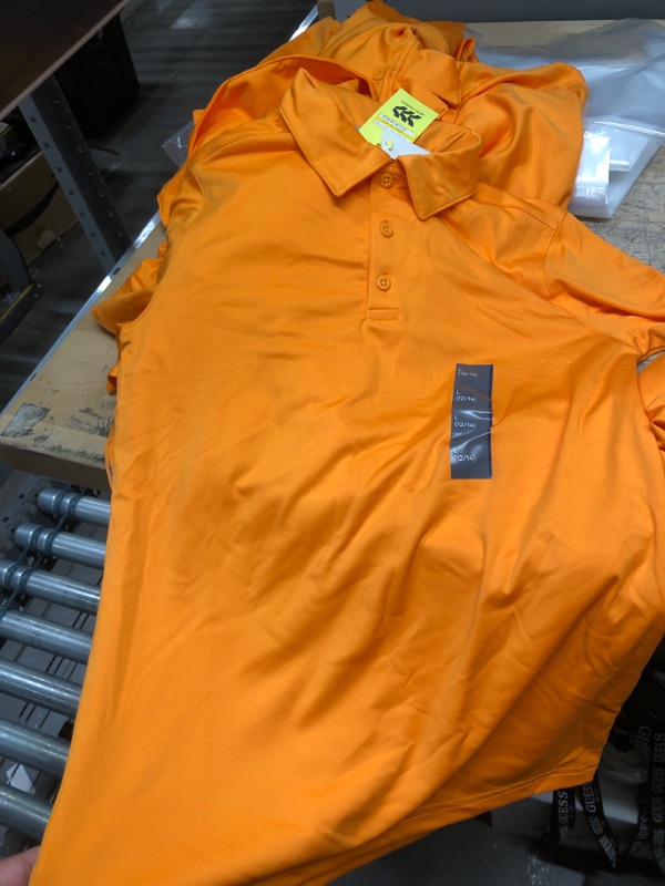 Photo 1 of 10 PACK ---CORE GOLF POLO 7KX1E9 ORANGE ASSORTED SIZES  KIDS /BOYS /GIRLS