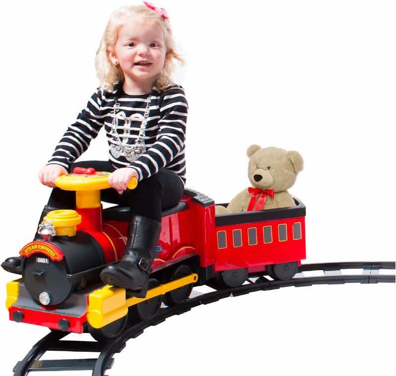 Photo 1 of Rollplay Electric Train Ride On for Kids Featuring Real Cold Water Steam, 22 Track Pieces, Detachable Caboose, Working Headlights and Sounds, with a Top Speed of 1 MPH, Red
