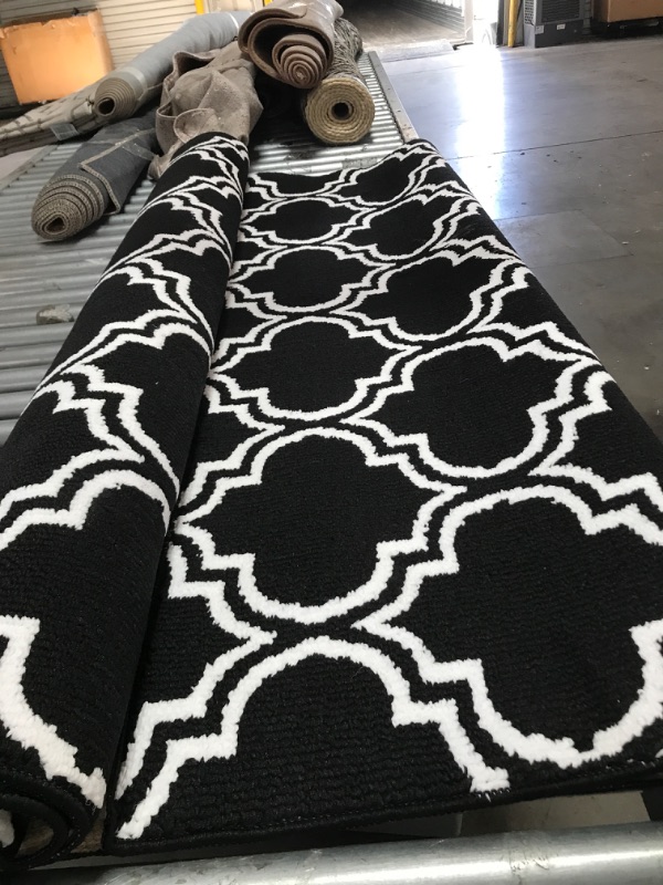 Photo 1 of 5x8 black/white area rug