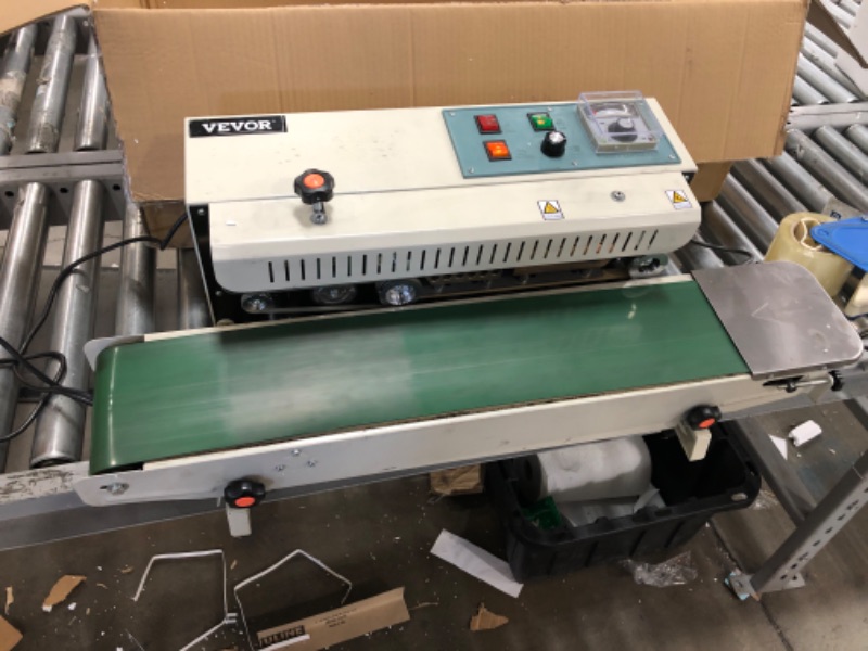 Photo 2 of VEVOR Continuous Bag Band Sealing Machine FR900K Band Sealer Machine with Digital Temperature Control Horizontal Bag Sealer for 0.02-0.08 mm Plastic Bags Continuous Band Sealer w/ Printing Function
