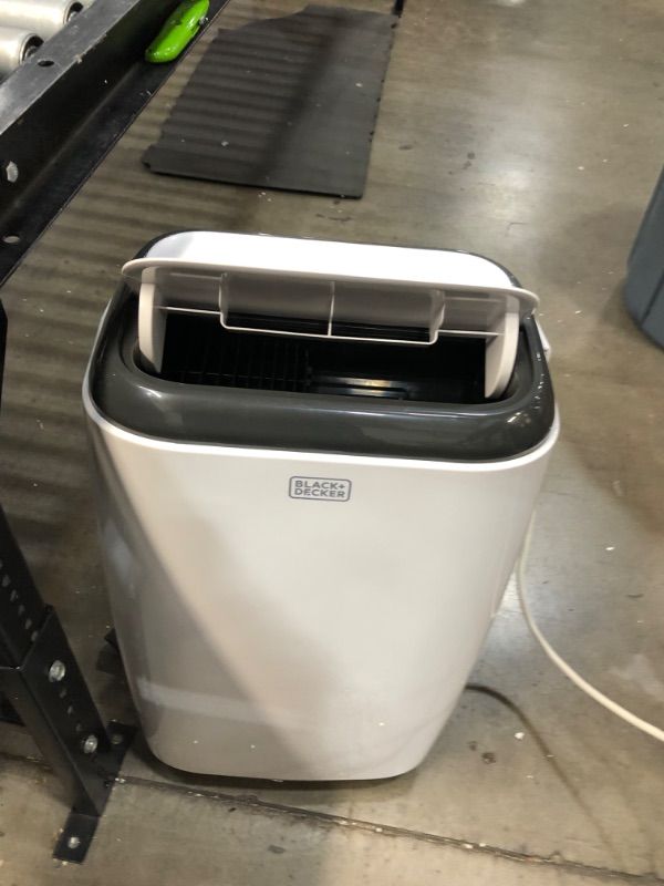 Photo 2 of --DAMAGED-VIEW PHOTOS-
BLACK+DECKER 12,000 BTU Portable Air Conditioner with Heat and Remote Control, White
