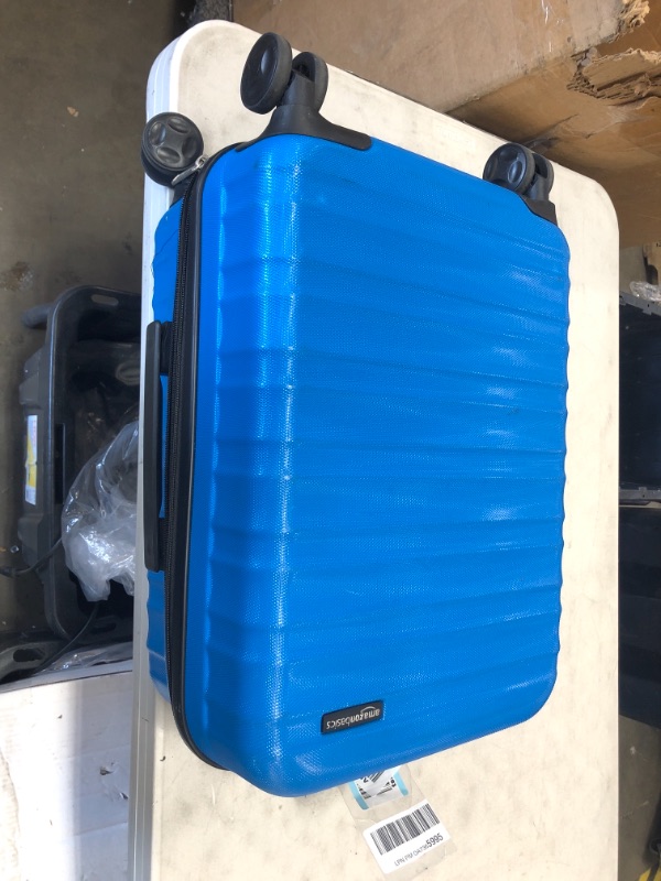 Photo 1 of Amazon Basics 21-Inch Hardside Spinner, Blue
