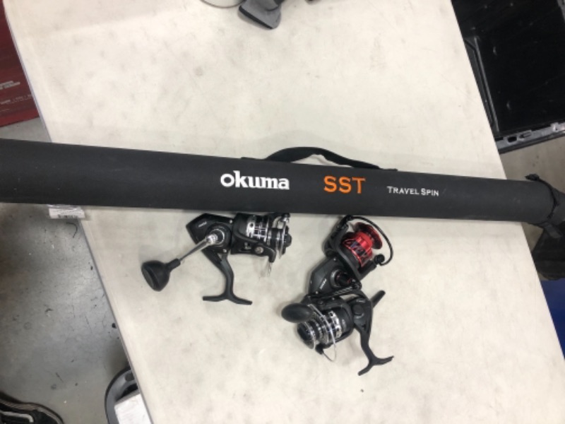 Photo 1 of *BUNDLE OF 3 ASSORTED FISHING REELS AND OKUMA TRAVEL CASE 

**4 ITEMS TOTAL