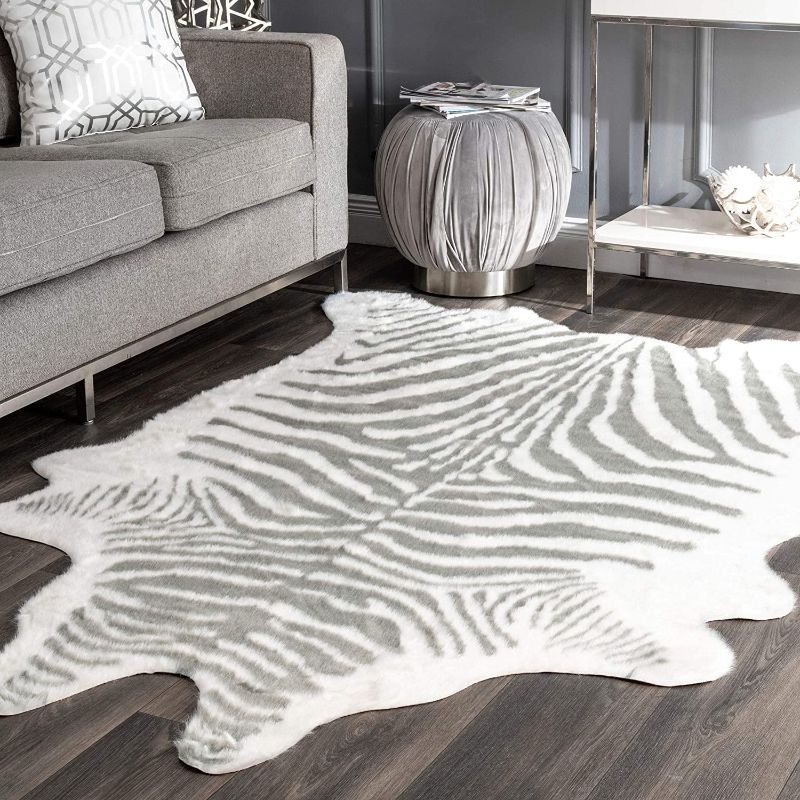 Photo 1 of  ITEM IS PINK INSTEAD OF GREY nuLOOM Cattle Faux Zebra Hide Area Rug, 5' x 6' 7", Grey
