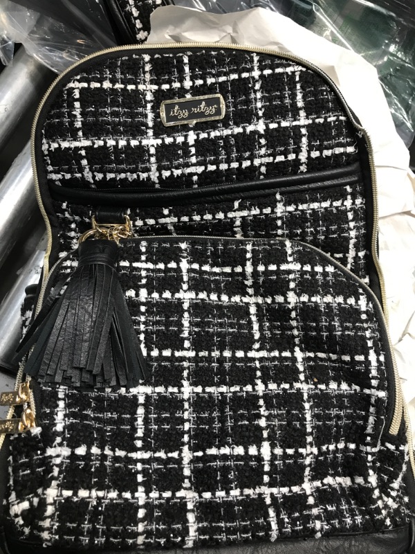 Photo 1 of Itzy Ritzy Diaper Bag Backpack – ‘The Kelly’ Large Capacity Boss Plus Backpack Diaper Bag Featuring 19 Pockets, Changing Pad, Stroller Clips and Comfortable Backpack Straps, Black & White Tweed
