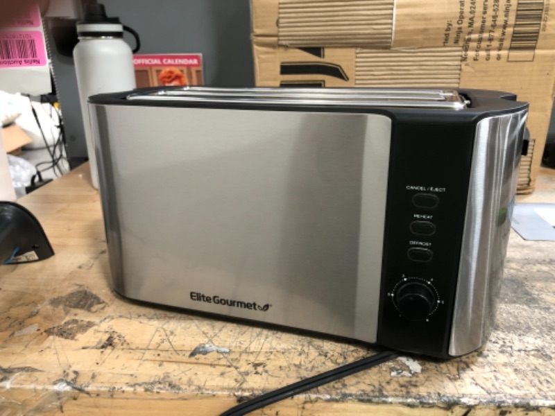 Photo 1 of Elite Gourmet ECT-3100 Long Slot 4 Slice Toaster, Reheat, 6 Toast Settings, Defrost, Cancel Functions, Built-in Warming Rack, Extra Wide Slots for Bagels & Waffles, Stainless Steel & Black
